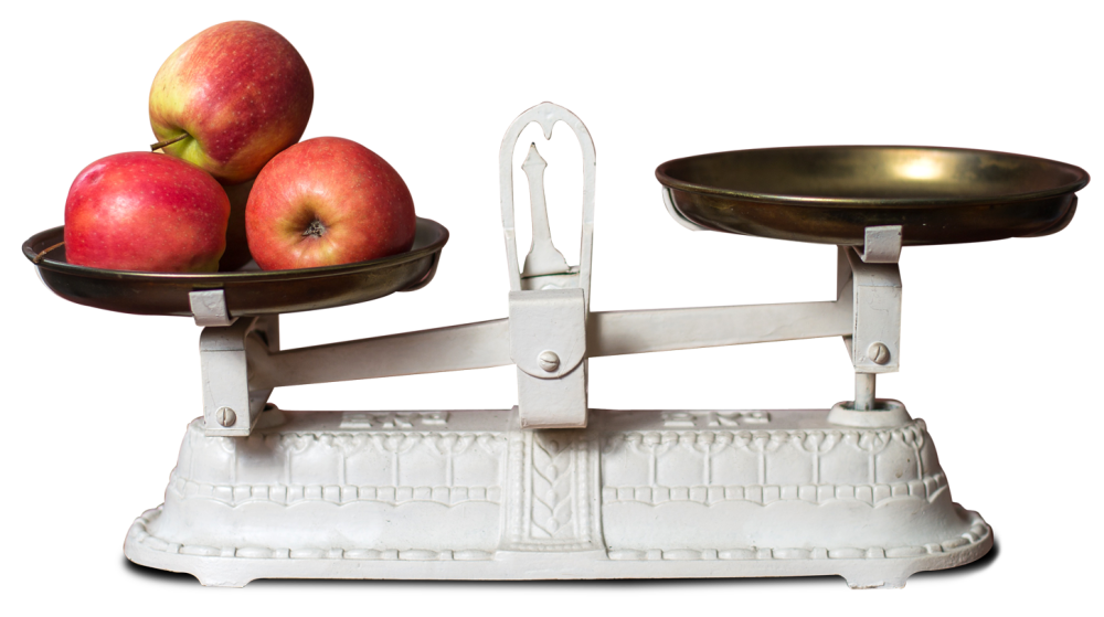 Een weegschaal met appels bedoeld als symbolische duiding naar good governance binnen de voedselproductie